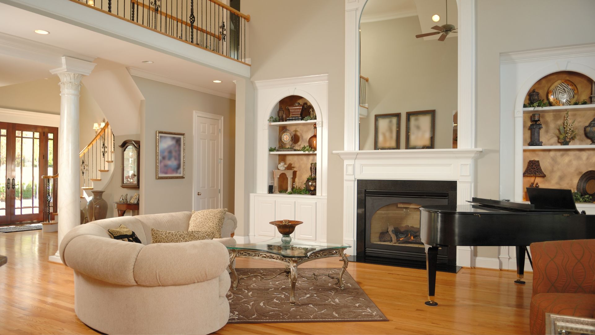 A living room filled with furniture and a fire place