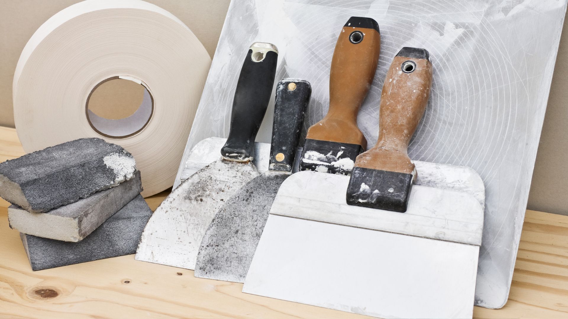 A group of tools sitting on top of a wooden table