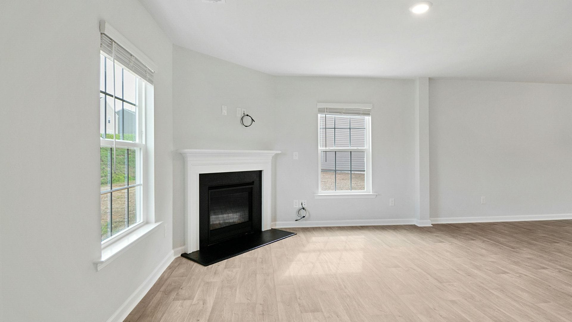 Freshly painted light gray living room with white trim in Great Falls, MT