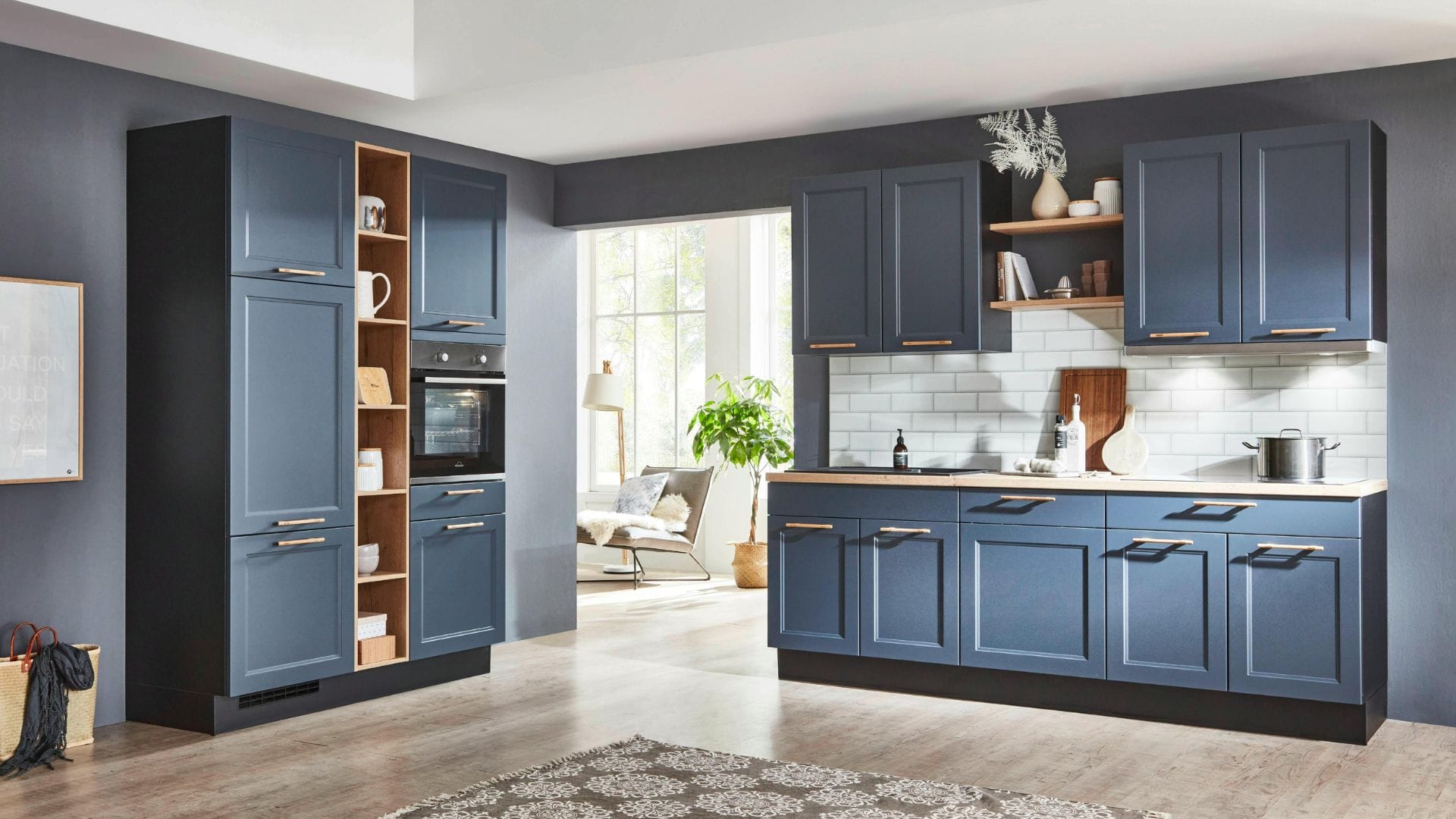 Kitchen cabinets refinished in deep navy with wood accents